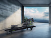 Modern rower in a room with large windows overlooking a scenic landscape