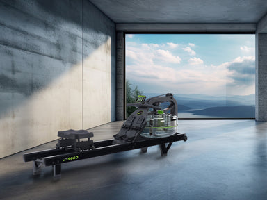 Modern rower in a room with large windows overlooking a scenic landscape