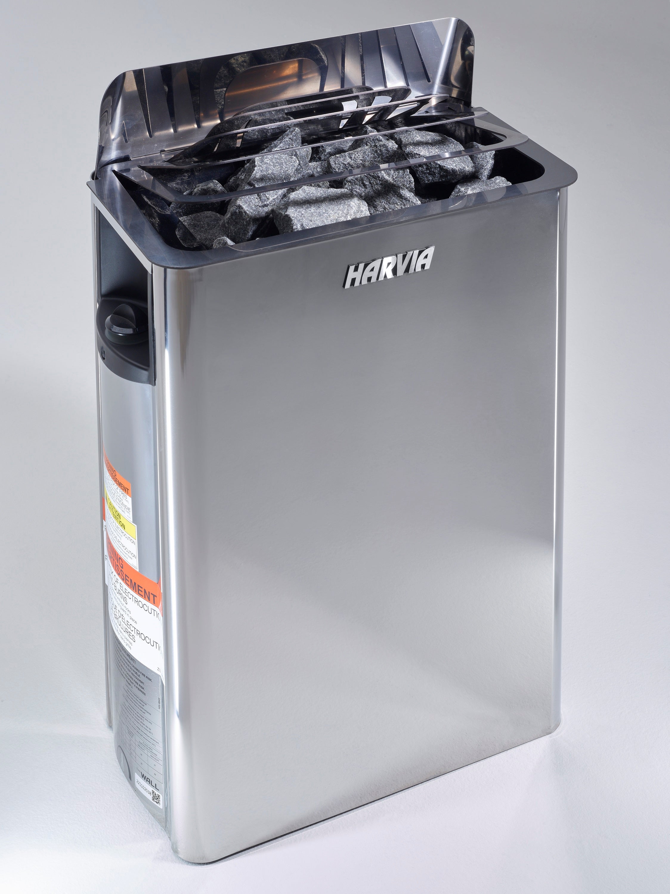 Stainless steel sauna heater with visible Harvia branding on a gray background