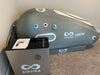 Hyperbaric chamber with AIRVIDA branding on a carpeted floor against a wall.