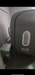 Sitting hyperbaric chamber in a gray room on a wooden floor with accessory units attached