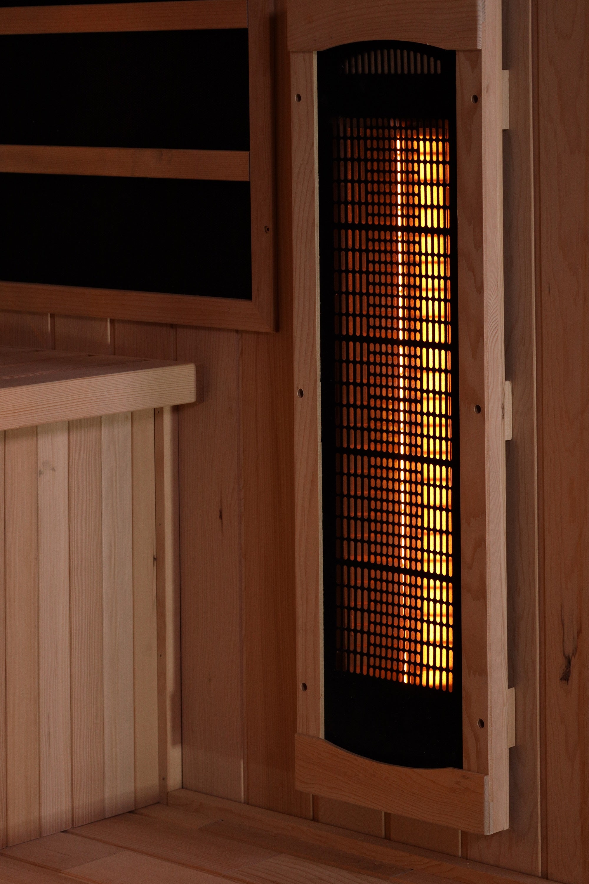 Infrared sauna heater in a wooden room