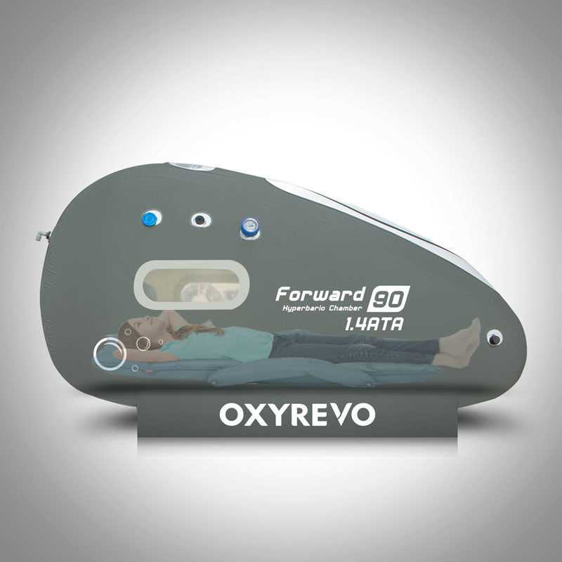 Oxyrevo hyperbaric chamber on a white background with a person laying down inside