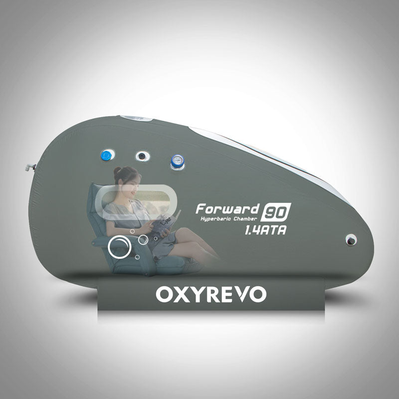 Oxyrevo hyperbaric chamber on a white background with a woman sitting inside reading a book