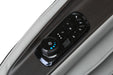 Close-up of a massage chair control panel with buttons and a knob on a white background