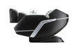 Black massage chair with silver accents on a white background