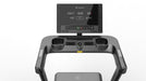 Treadmill with a digital display panel on a white background