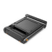 Black treadmill folded on a white background