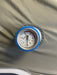 Pressure gauge on a gray fabric surface