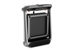 Black treadmill folded with screen on a white background