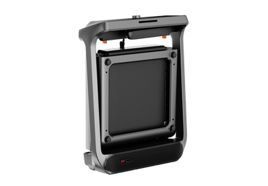 Black treadmill folded with screen on a white background