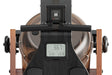 Rowing machine with digital display on a white background